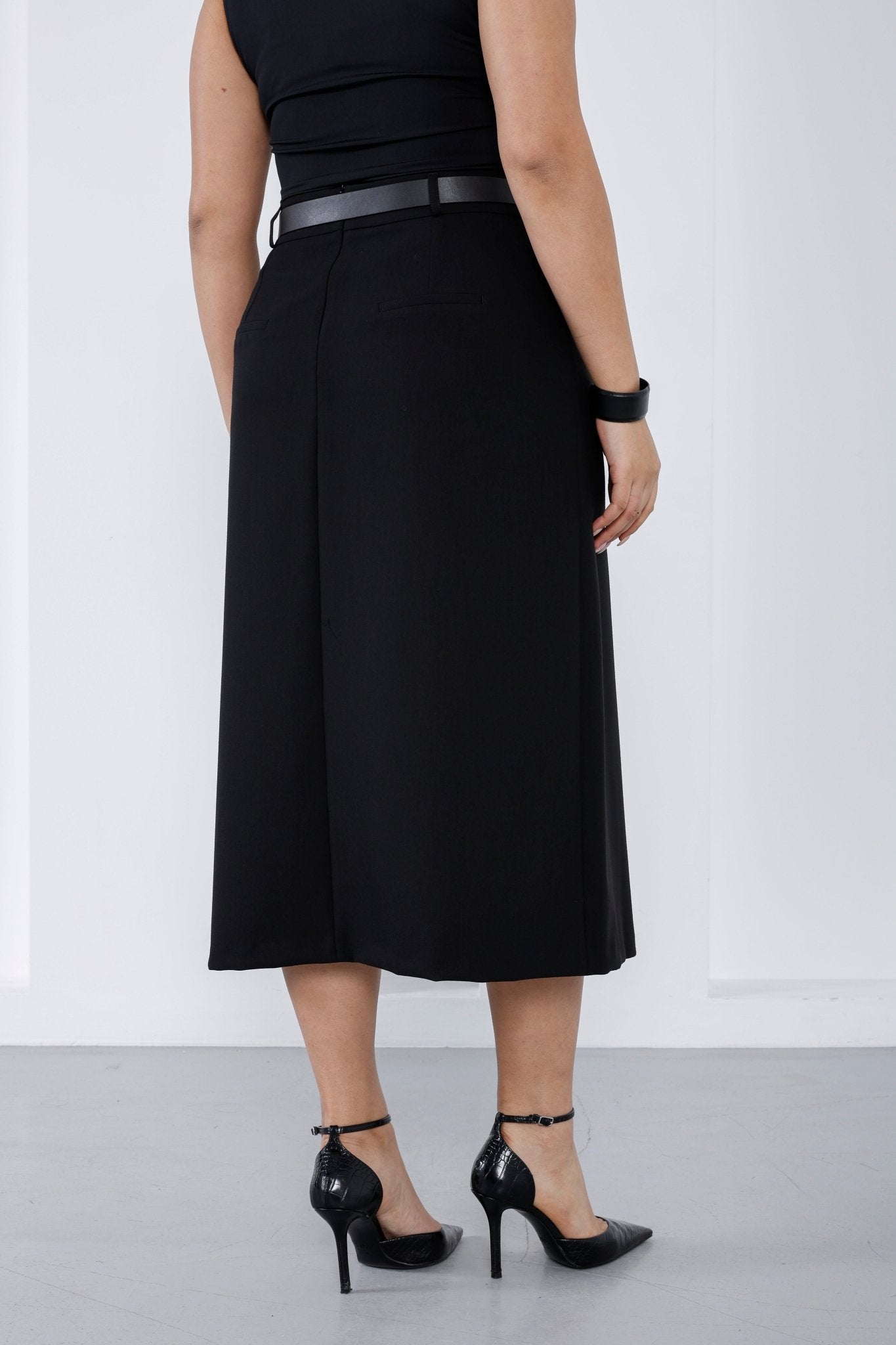 Premium A-line wholesale midi skirt for professional women's wear - Elitline Black Color Back View 