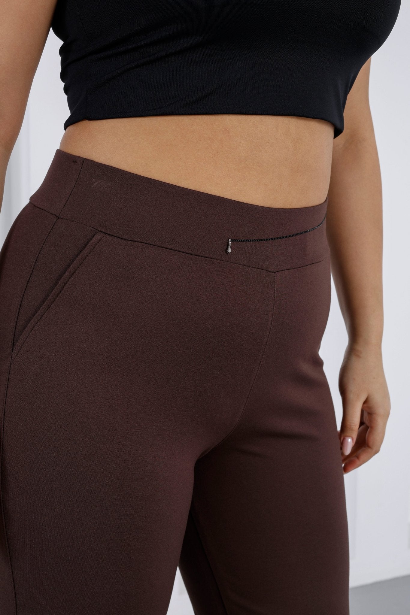 Wholesale luxury women's high-rise ponte pants with crystal waist detail - Elitline Brown details on waist