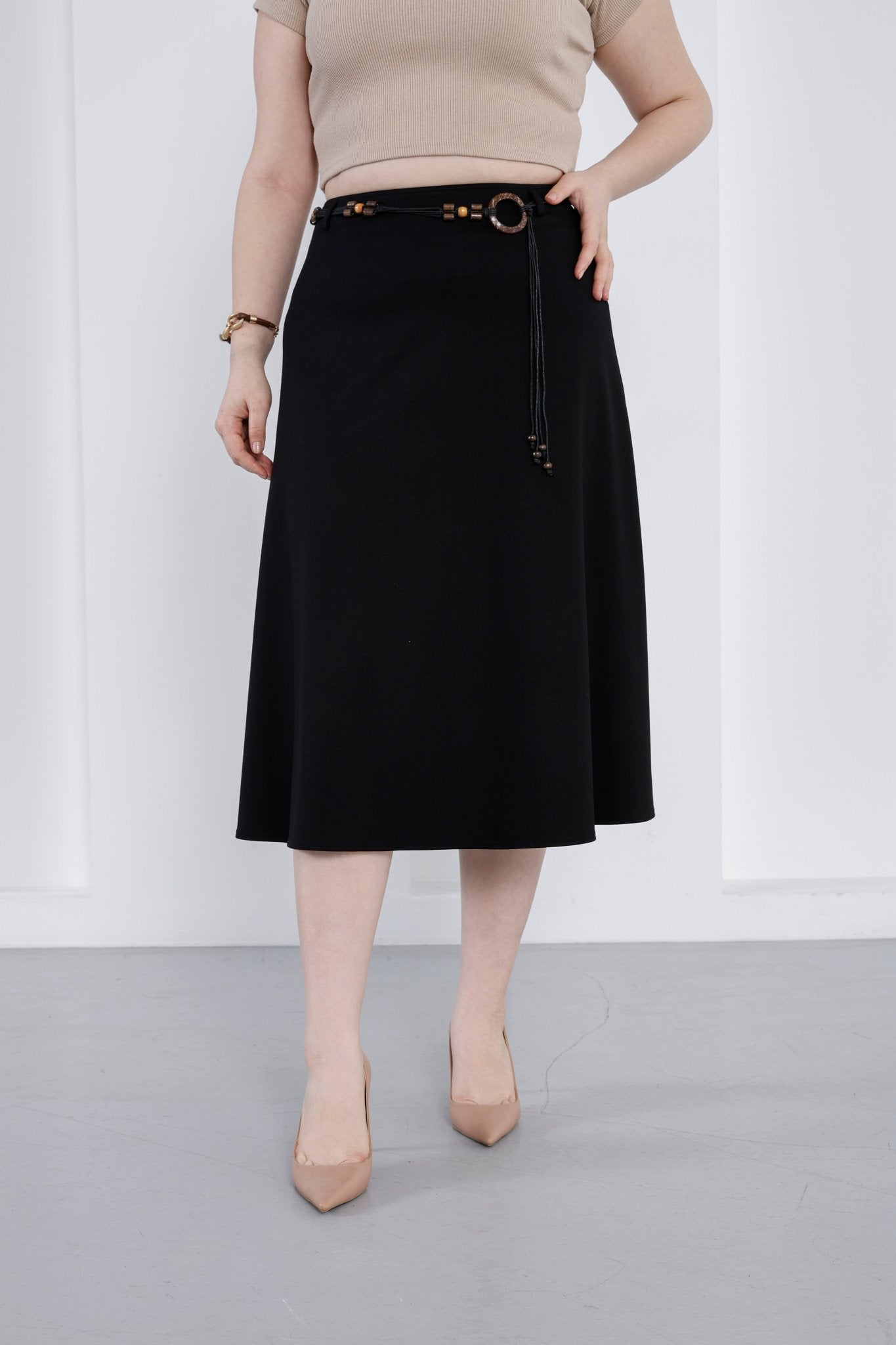 Wholesale Women's High-Rise Ponte Midi Skirt with Slim Belt - Elitline Dark Black Color Front View of skirt