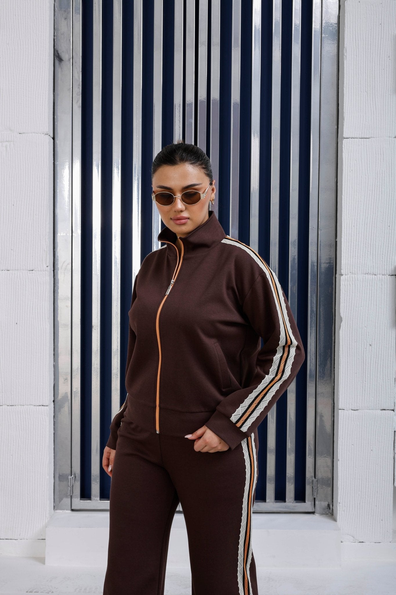 Floral lace side stripe detail on luxury wholesale joggers - Elitline dark brown color front view 2