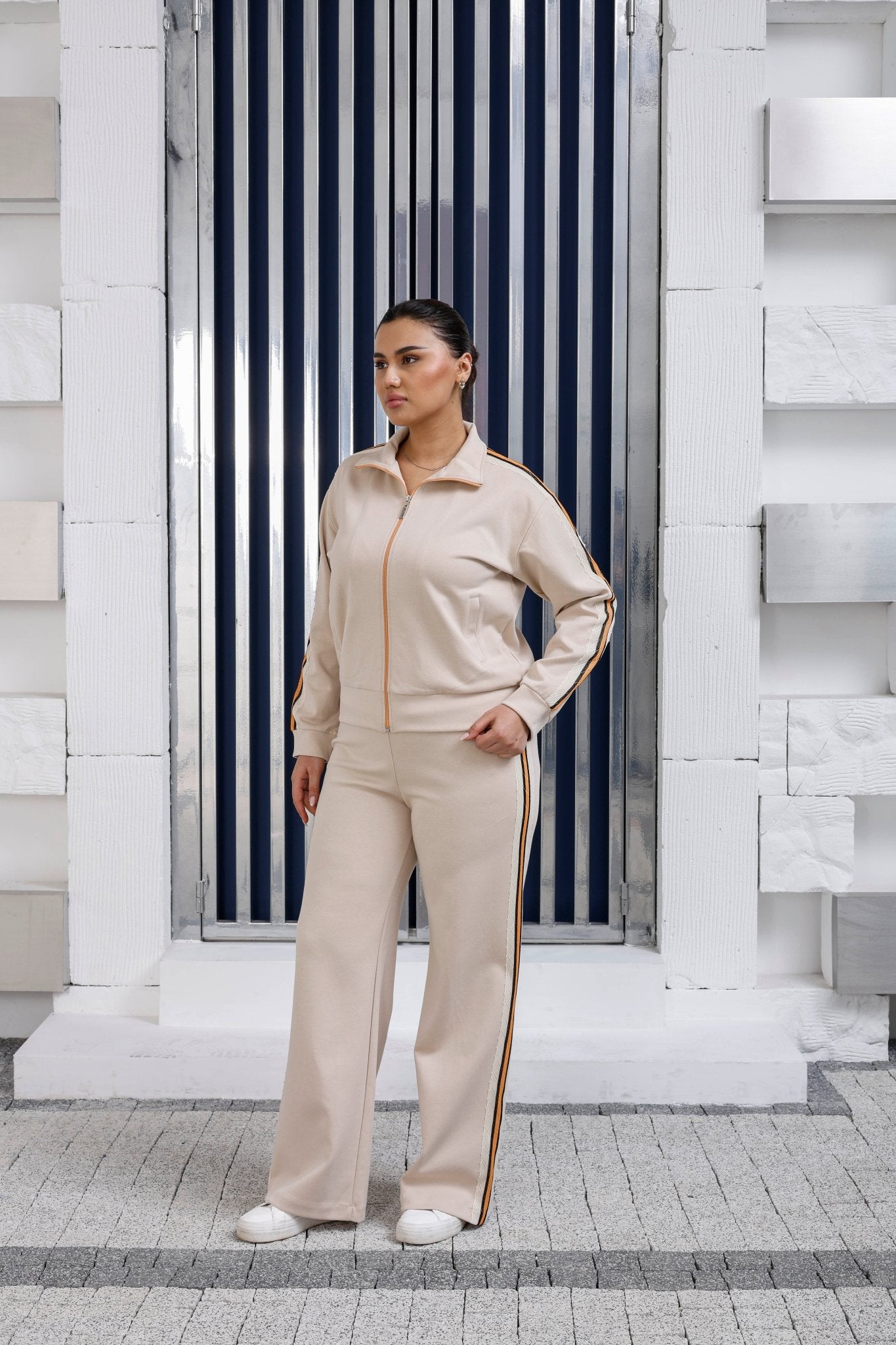 Floral lace side stripe detail on luxury wholesale joggers - Elitline beige color front view 3