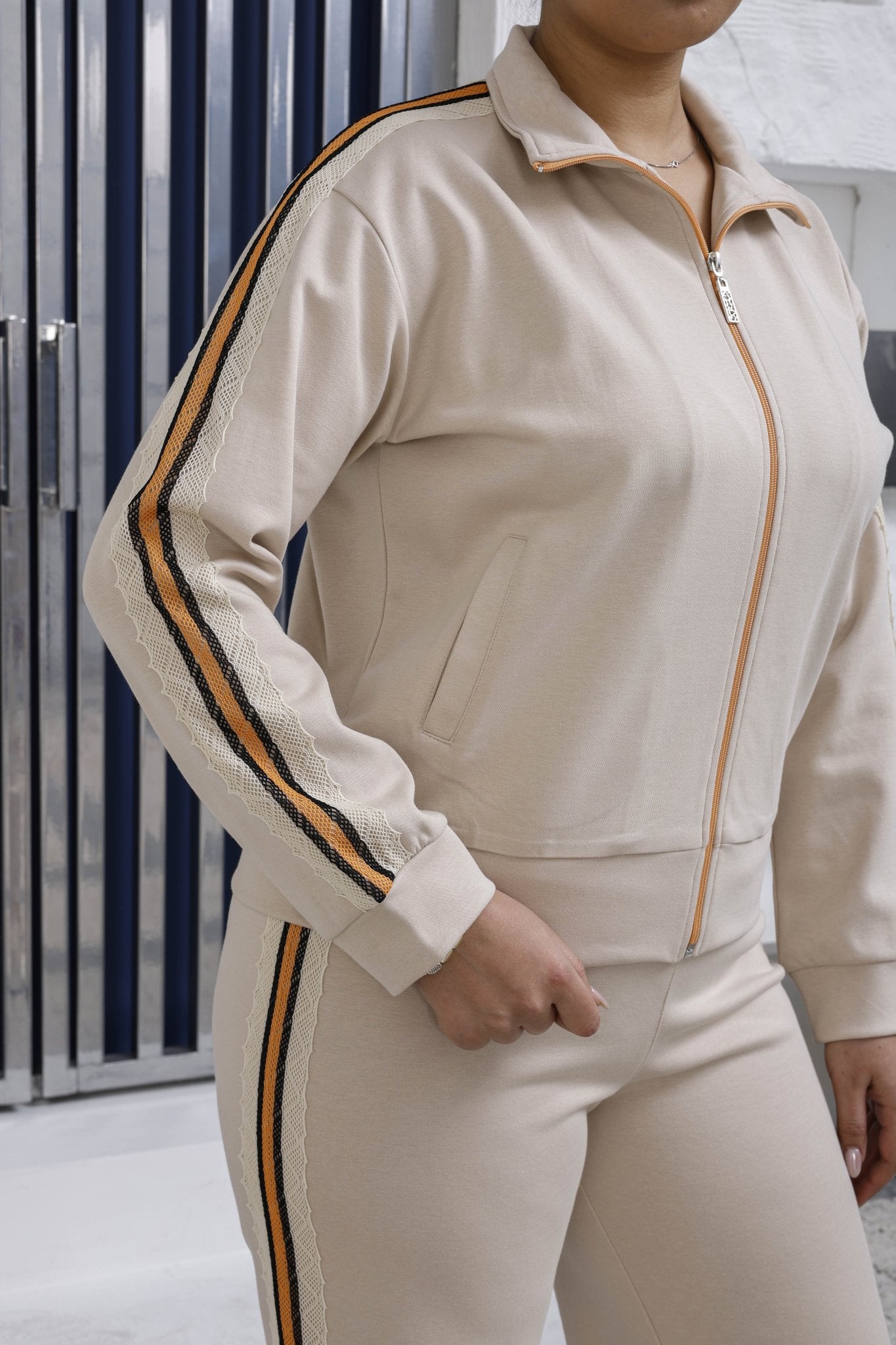 Floral lace side stripe detail on luxury wholesale joggers - Elitline beige color front view details